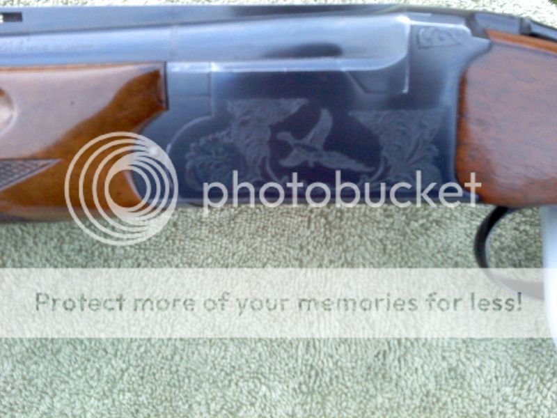 Weatherby Orion 12g O/U (skb manufacture) 28" tubes, 5 chokes, case